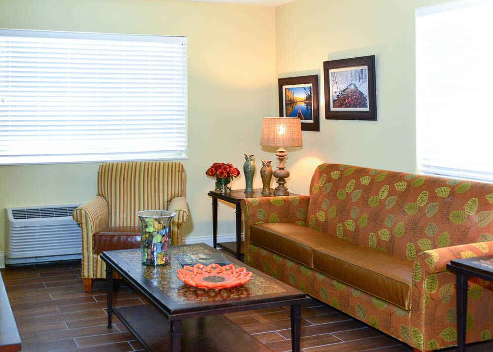 Senior living room at Villa Manor Care Center with cozy furniture and home decor.
