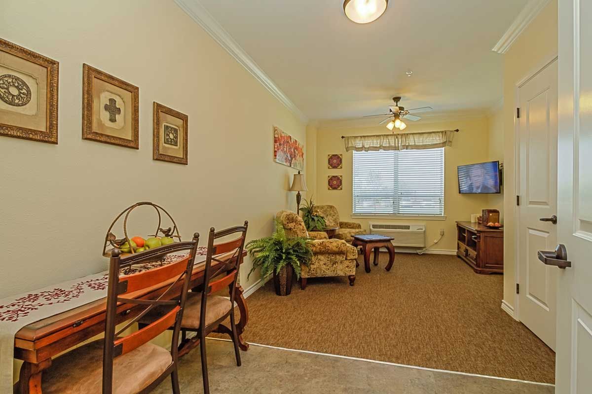 Interior view of Corner Midtowne senior living community featuring modern electronics and decor.