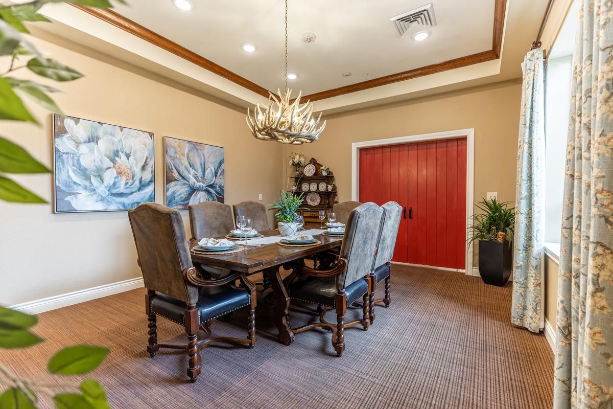 Interior view of Midtowne senior living community featuring elegant dining room with tasteful decor.
