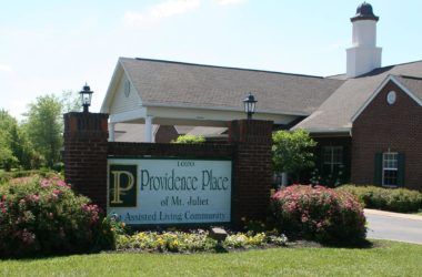 Providence Place of Mt. Juliet, a senior living community with lush vegetation and park-like outdoors.