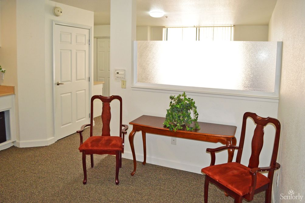 Senior living room at Marymount Villa Retirement Center with elegant furniture and decor.