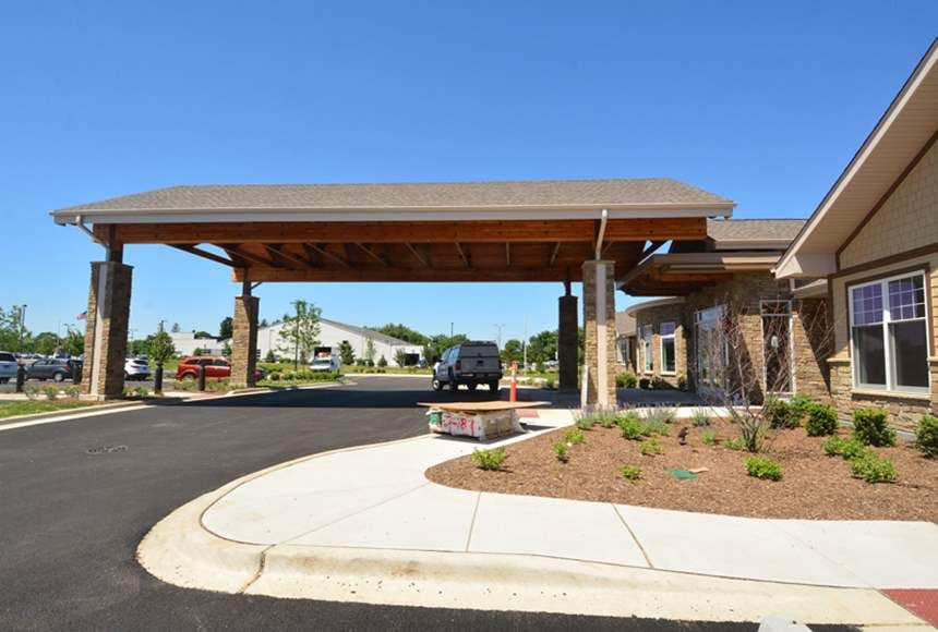 Silverado St. Charles senior living community with modern architecture, outdoor spaces, and transportation.
