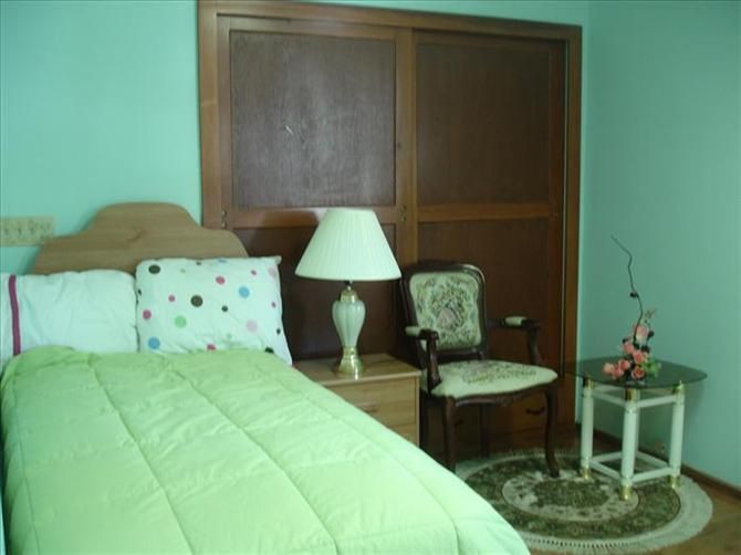 Interior of a bedroom in Lamp Senior Living Community, featuring Korean-inspired home decor and furniture.
