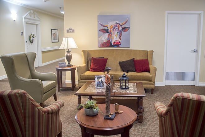 Senior living room at Brookdale North Austin with modern furniture, art, and decor.