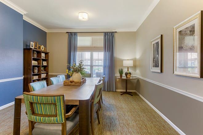 Interior view of Brookdale East Arbor senior living community featuring dining room decor and architecture.