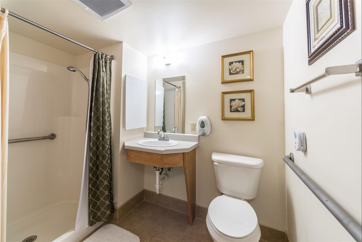 Senior living bathroom with corner sink at Autumn View Gardens, Creve Coeur.