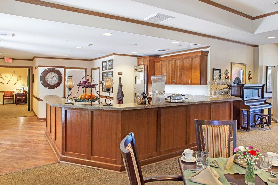 Interior view of Sunrise of Chandler senior living community featuring a well-designed kitchen and dining area.