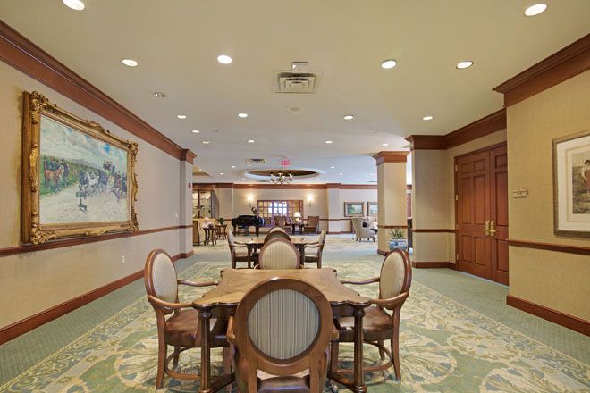 Interior view of Brookdale Creve Coeur senior living community featuring dining and reception areas.