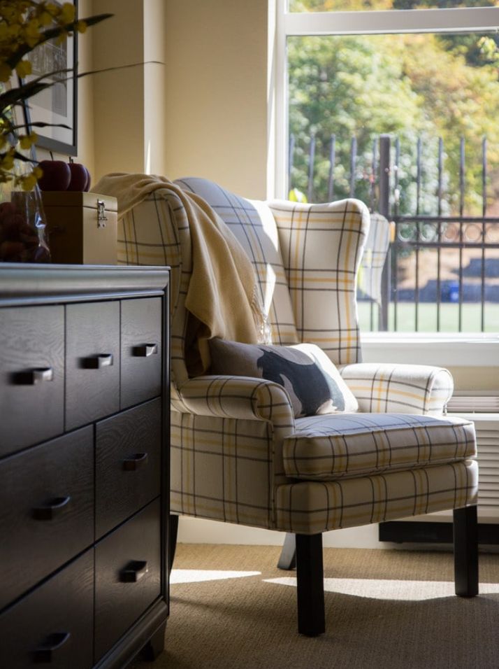 Comfortable furniture including chairs and armchairs in Aegis Living Pleasant Hill senior community.