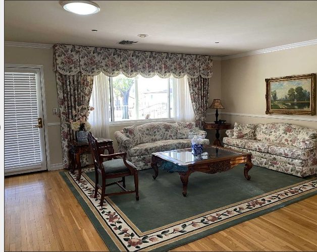 Senior living community interior at The British Home in California, featuring elegant furniture and art.