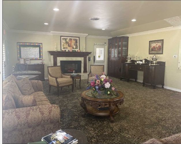 Senior living community interior at The British Home in California, featuring cozy furniture and art.