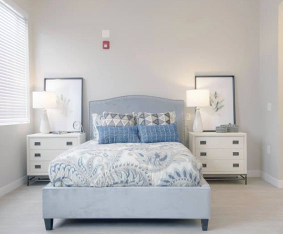 Senior living community bedroom at Park View Estates with cozy decor and furniture.