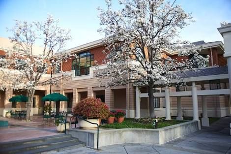 Senior living community, The Terraces of Los Gatos, featuring urban architecture and lush nature.