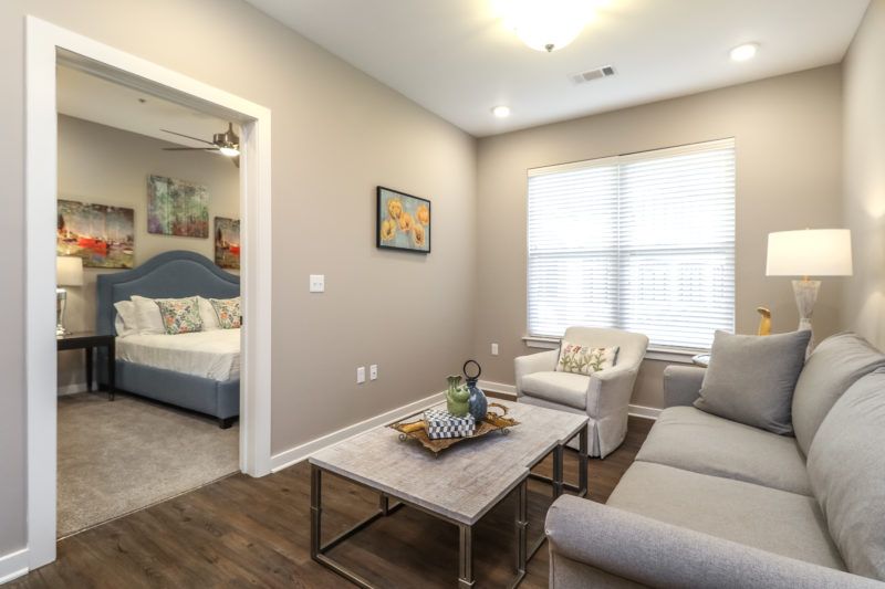 Interior view of Tiffany Springs Senior Living room with modern furniture and home decor.