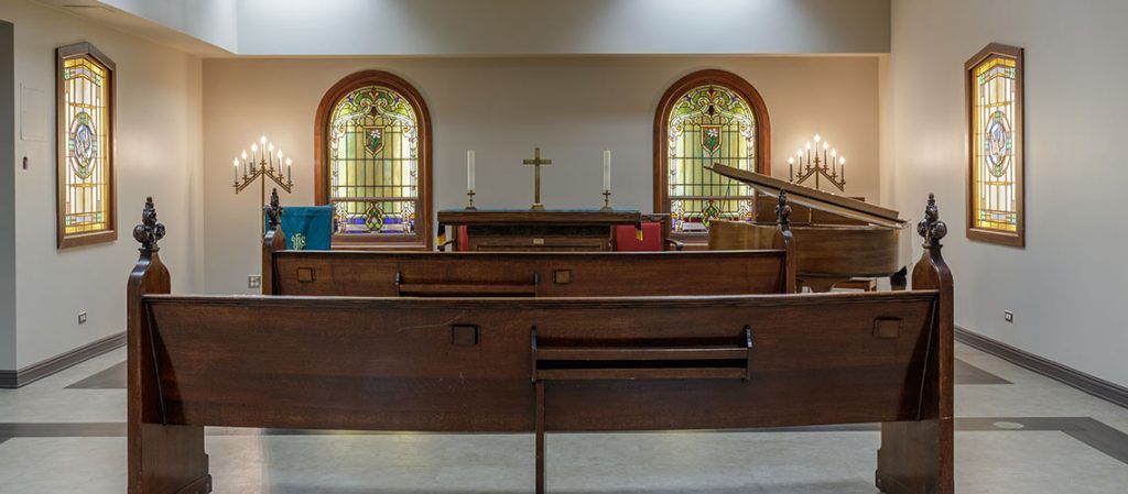 Altar and chapel interior at Bridgeway of Bensenville senior living community.