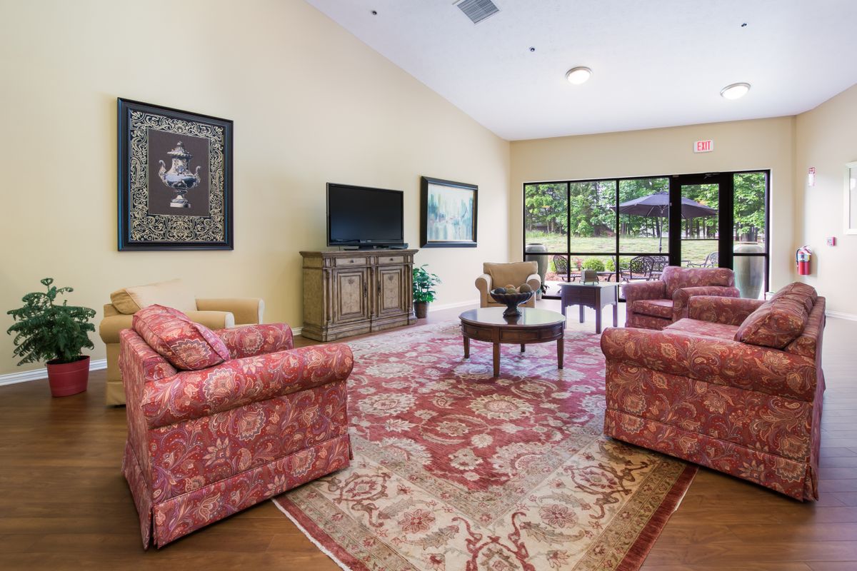 Senior living room interior at Mount Washington featuring modern architecture, furniture, and decor.