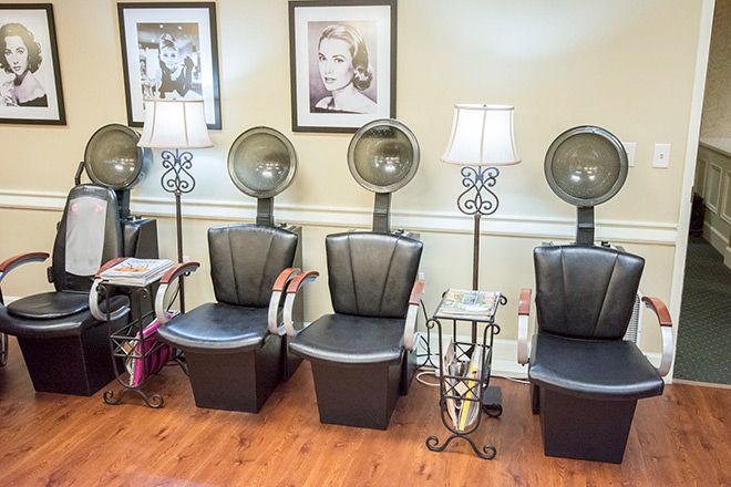 Senior resident relaxing in a chair at Brookdale Green Hills Cumberland's beauty salon.