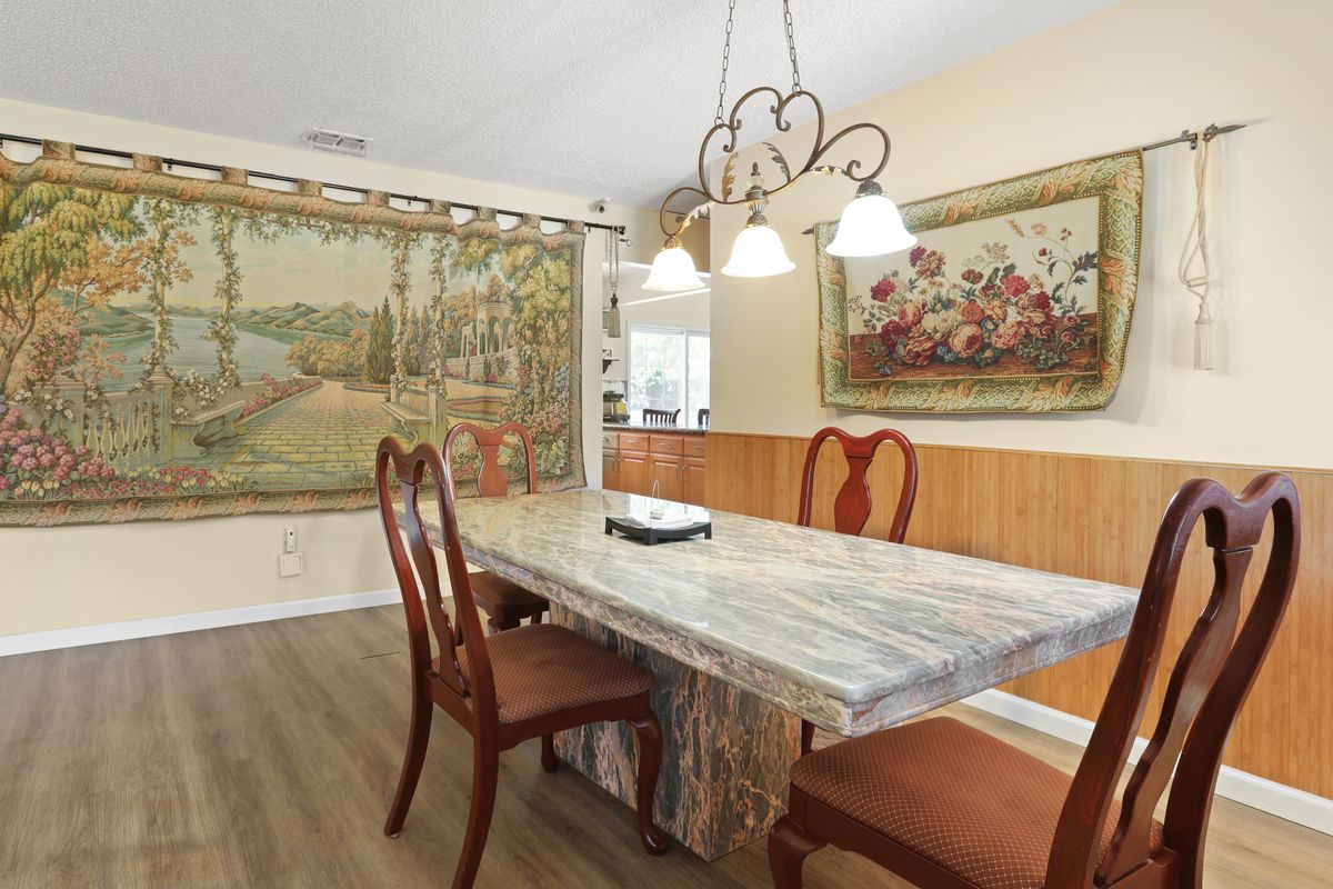Interior view of Robert Creek Villa senior living community featuring elegant dining room design.