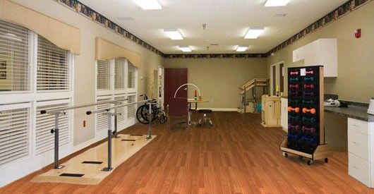 Wooden flooring and furniture in Shelby Crossing Health Campus, a senior living community.