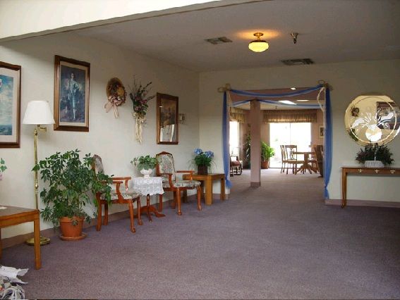 Senior residents enjoying in the dining area of Rialto Assisted Living with elegant decor.