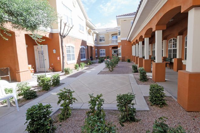 Brookdale North Scottsdale senior living community featuring urban architecture and outdoor furniture.