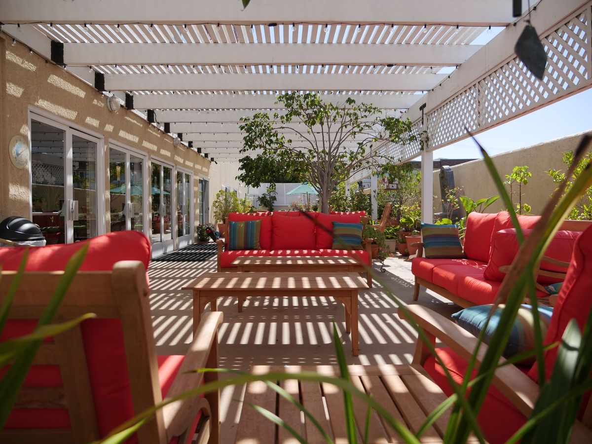 Senior living community at Harbor Terrace Retirement Center, featuring indoor and outdoor living spaces.