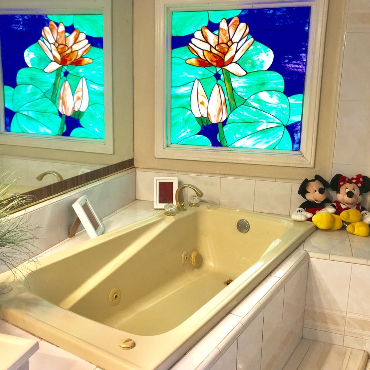 Senior enjoying a relaxing bath in a well-designed bathroom at Happy Home Care For Elderly.