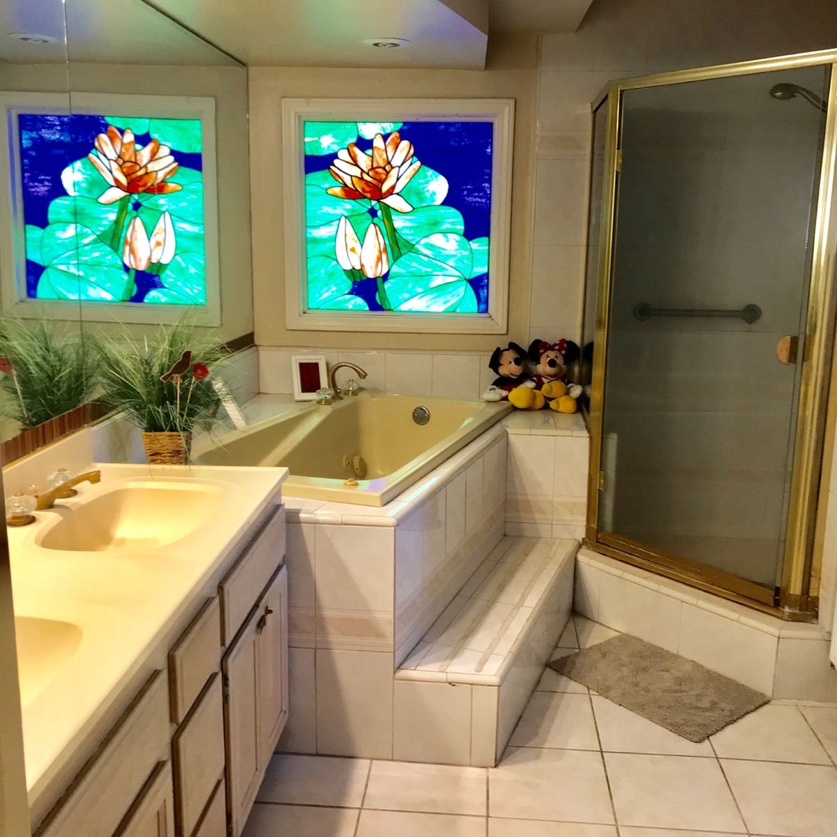 Senior enjoying modern amenities in a well-designed bathroom at Happy Home Care For Elderly.