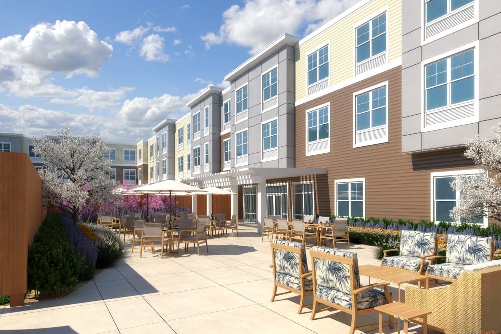 Senior living community in Natick featuring modern architecture, urban condos, and furnished housing.