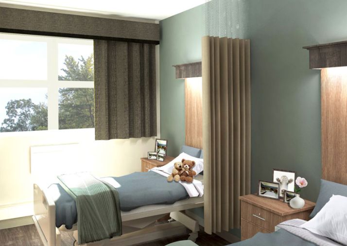 Interior view of Warren Park Health & Living Center featuring spa-like decor, bed, and furniture.