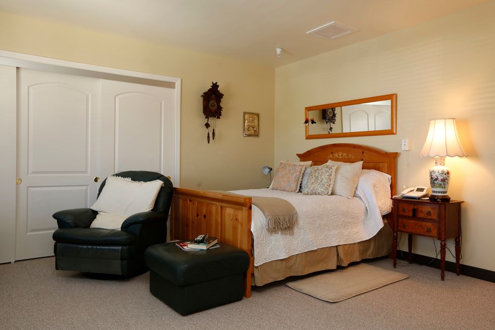 Interior view of Nazareth House senior living community featuring stylish furniture and decor.