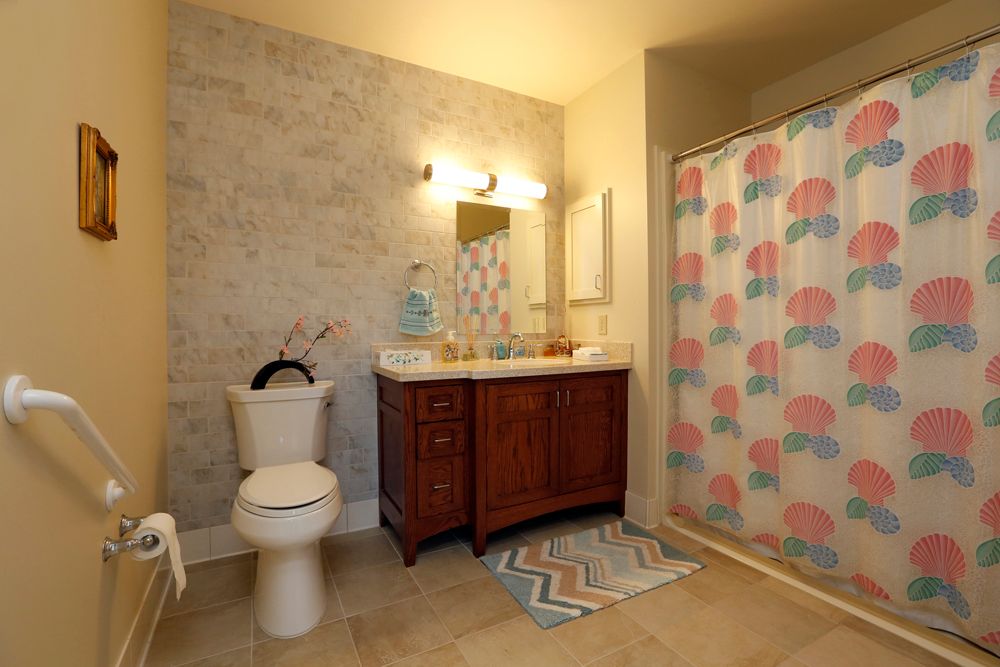 Interior view of a well-designed bathroom in Nazareth House senior living community.