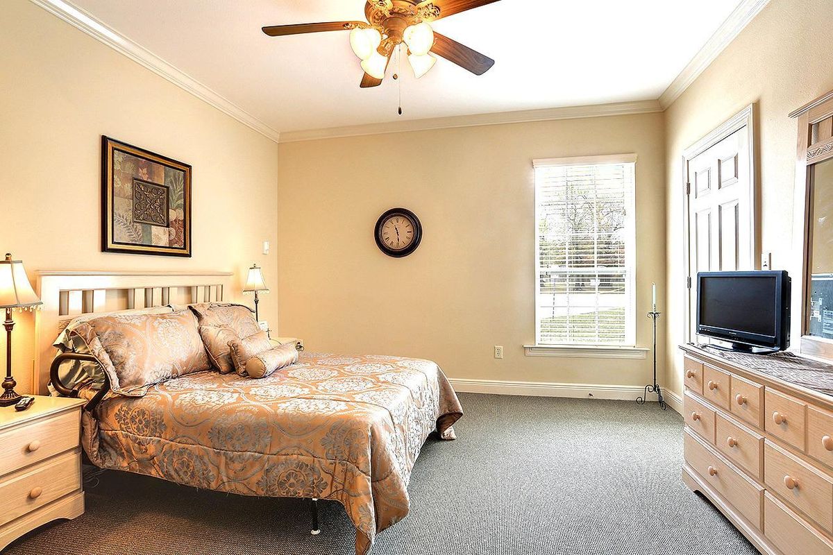 Interior view of Summerfield Senior Living in Slidell featuring modern electronics, furniture, and decor.