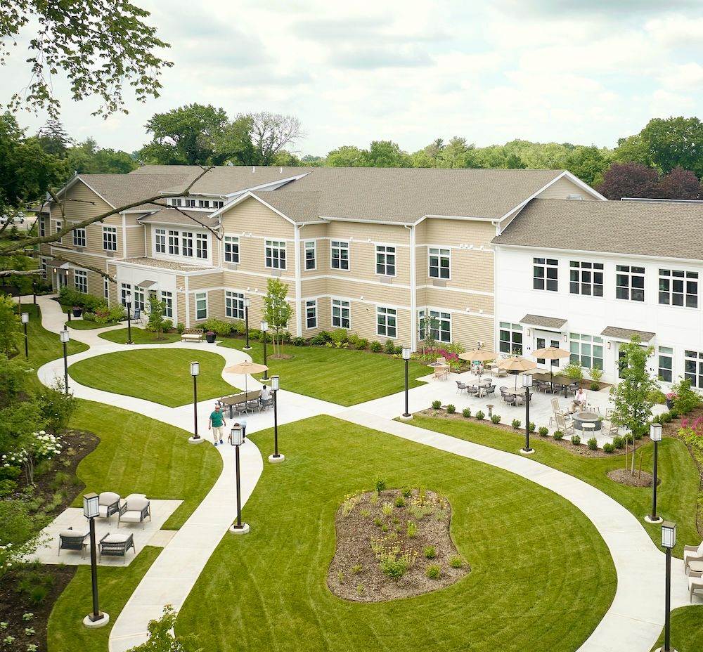 A view of the back patio and gardens at Monarch Coopers Corner, a senior living community in New Rochelle, NY. 