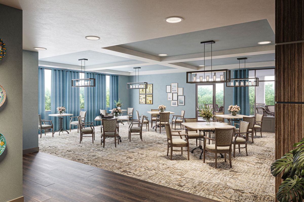 Interior view of The Gallery At North Port senior living community featuring elegant dining room decor.