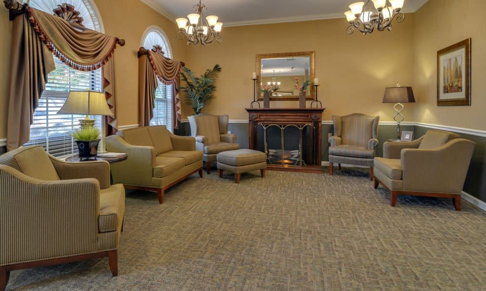 Interior view of Auburn Creek Assisted Living with elegant decor, furniture, and artwork.