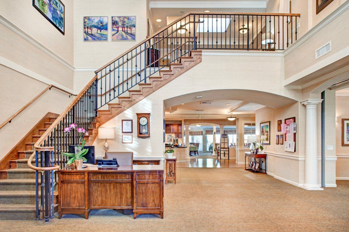 Senior living community Ivy Park at West Hills featuring architecture, indoor foyer with art.