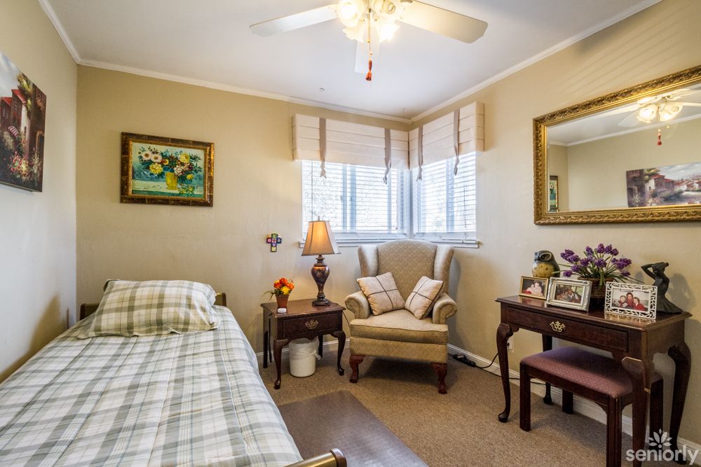 Senior living community interior at Damenik's Home, Daly City, featuring cozy decor and modern appliances.
