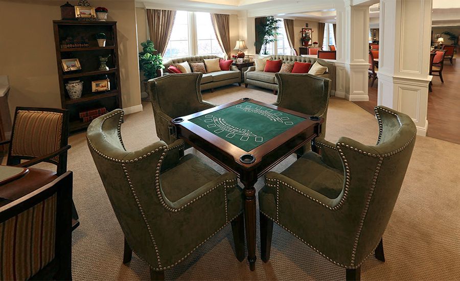 Senior living community interior at Kensington Place, Redwood City featuring modern furniture and decor.