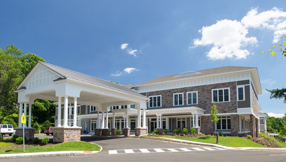 Senior living community, The Residence at Selleck's Woods, featuring suburban architecture.