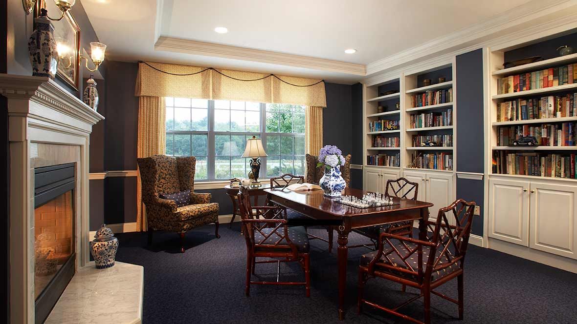 Senior living community Atria Fairhaven featuring elegant interior design, dining room, and library.