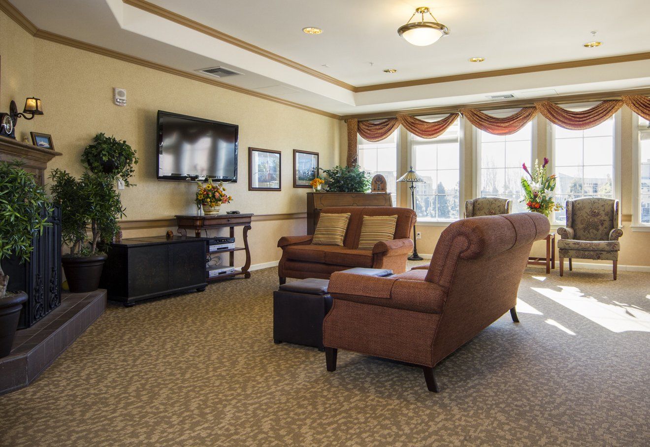 Interior of a living room at Ivy Park senior living community, featuring modern decor and furniture.