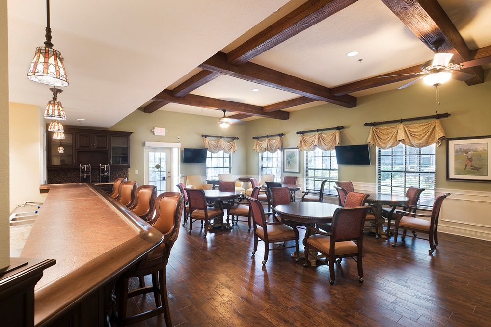 Interior view of Regency Oaks senior living community featuring dining area and modern amenities.