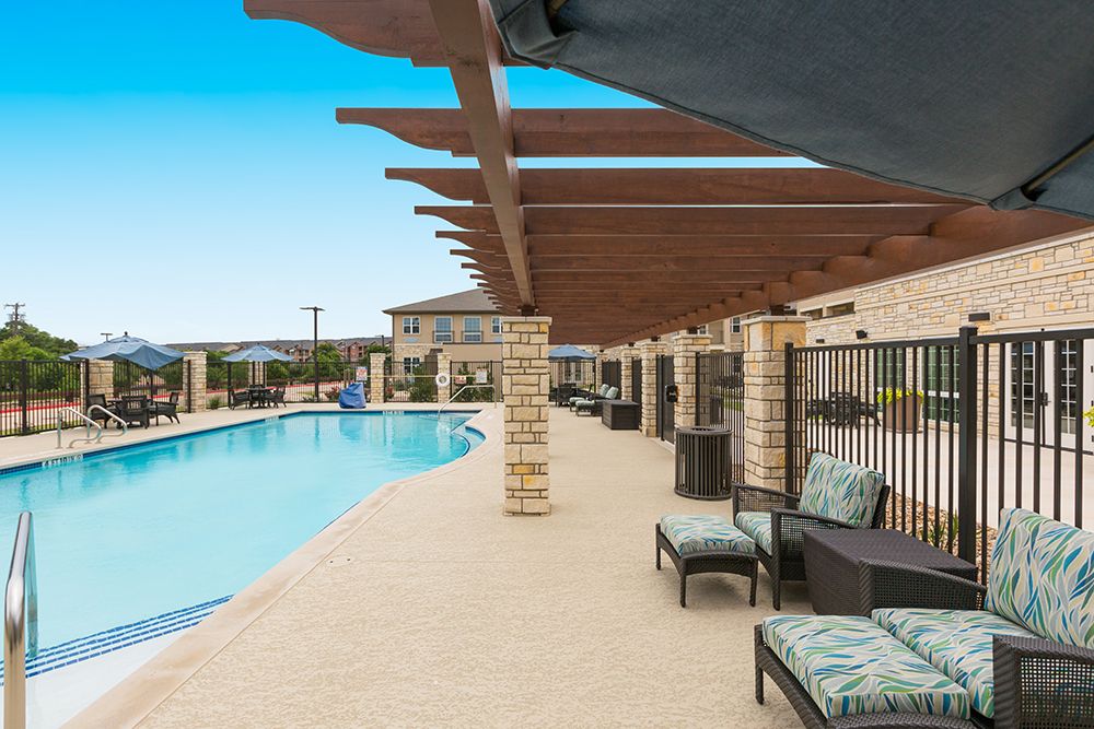 Senior living community, The Enclave at Round Rock, featuring resort-style architecture and amenities.