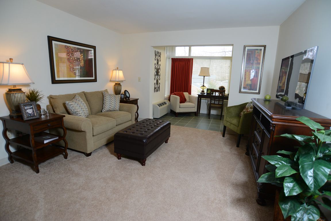 Interior view of Aspenwood Senior Living Community featuring modern architecture, furniture, and decor.