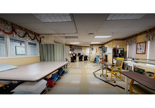 Senior living community at Walpole Healthcare featuring hospital buildings, clinic, and art.