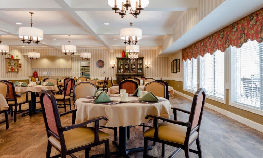 Interior view of Robinwood Landing senior living community featuring dining room decor and architecture.