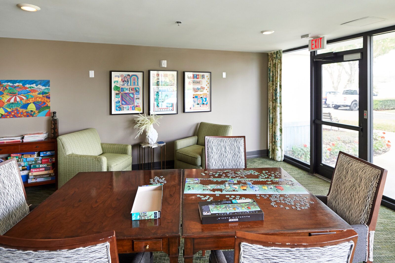 Interior view of Renaissance North Tampa senior living community featuring elegant dining and living room decor.