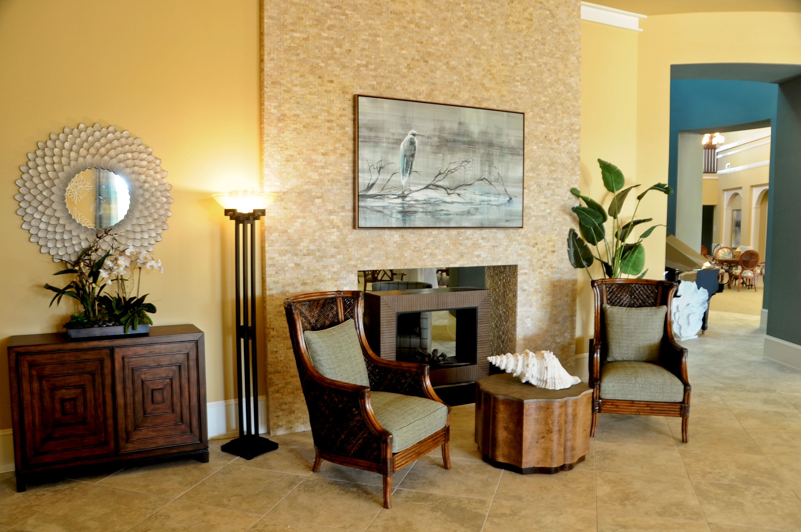 Interior view of Silver Creek senior living community featuring tasteful decor and a cozy fireplace.