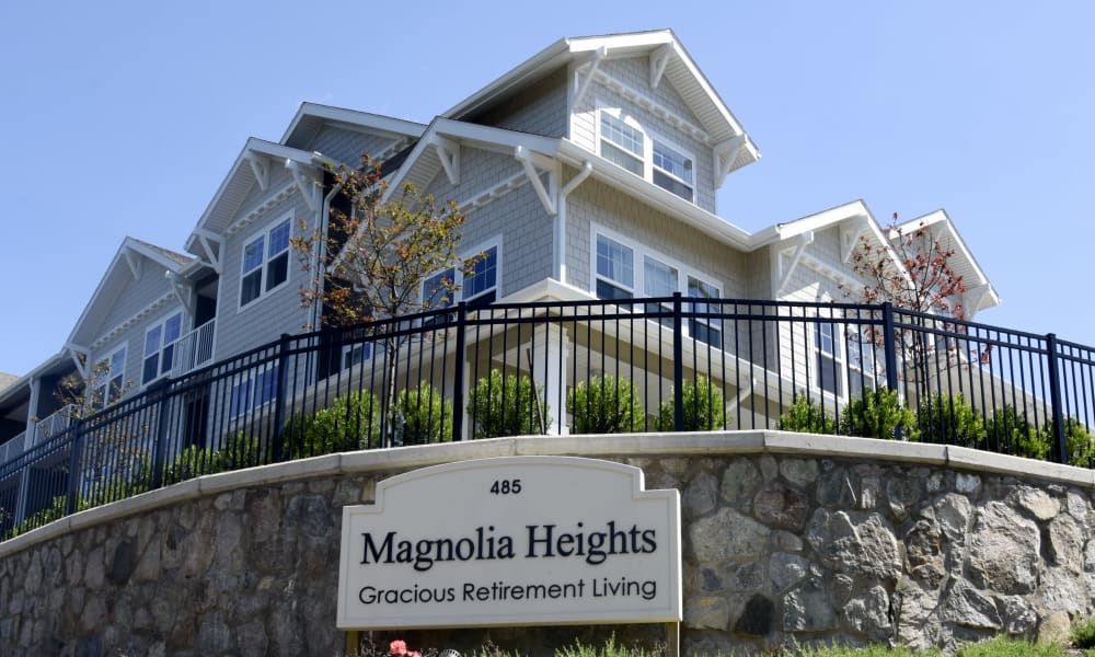 Waterfront Magnolia Heights Retirement Living community with urban high-rise apartments.